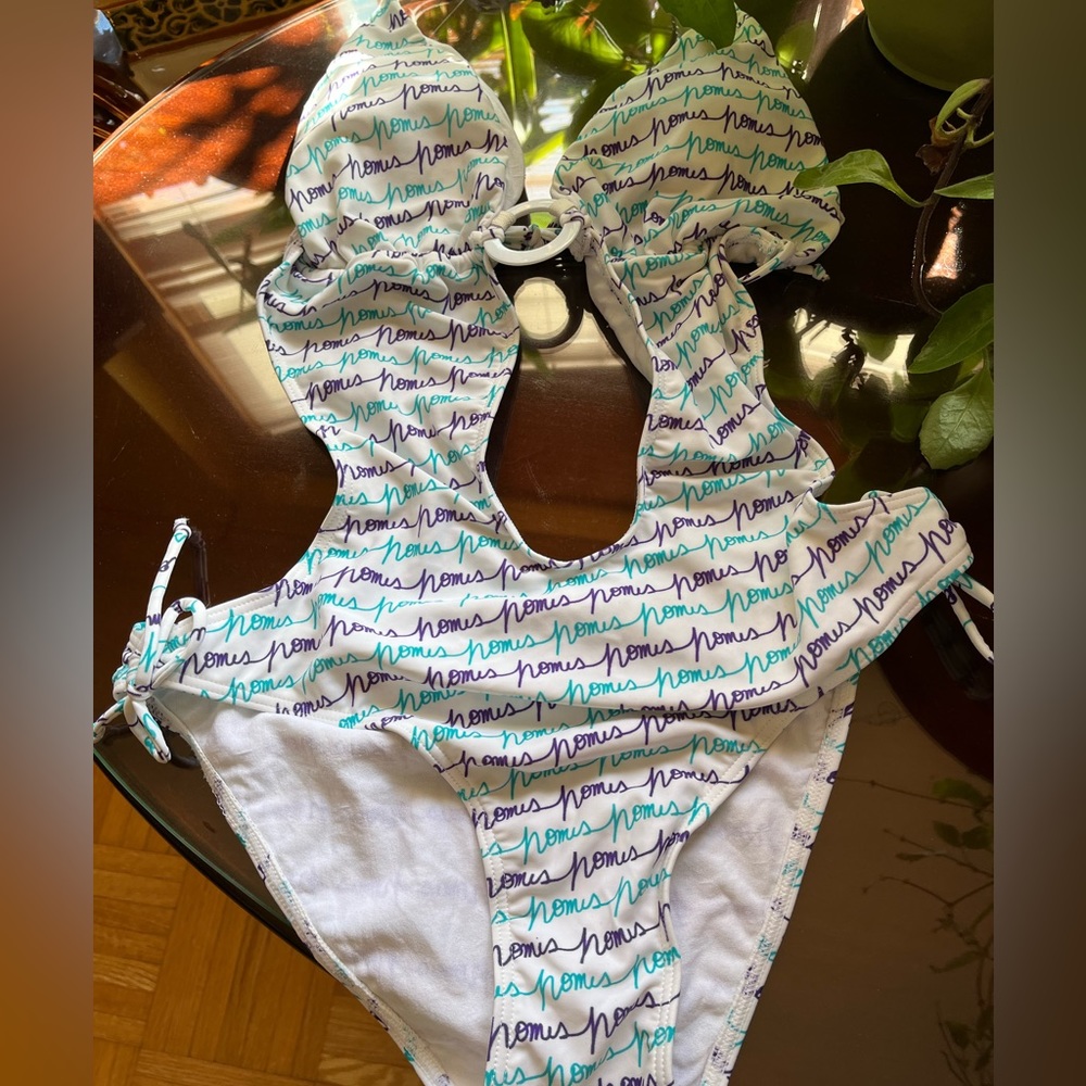 Nomis Women’s One piece White swim suit in Size Large